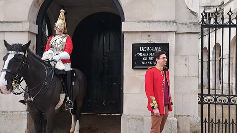 guard looking at tourist with fake uniform #horseguardsparade