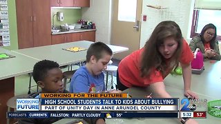 High school students talk to Elementary students about bullying for 'Unity Day'