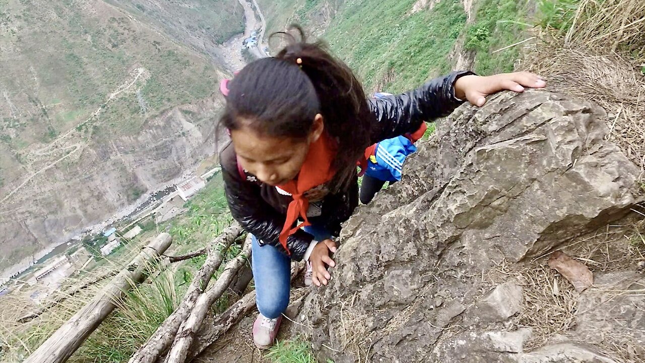 The Most Dangerous Journey to School in the World ...Little Kids Climbing a 2,624 Foot Cliff