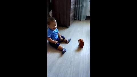 Small Kid Talking with Doll