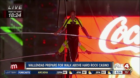 Tightrope walkers perform above Hard Rock Casino Tampa