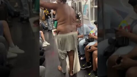 Homeless man unexpectedly grabbed a lady’s food tray on the subway.