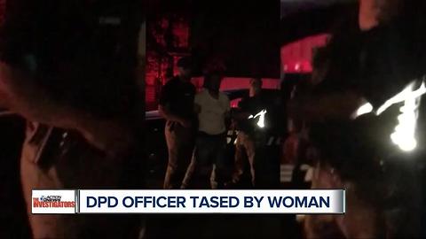 DPD officer tased by woman