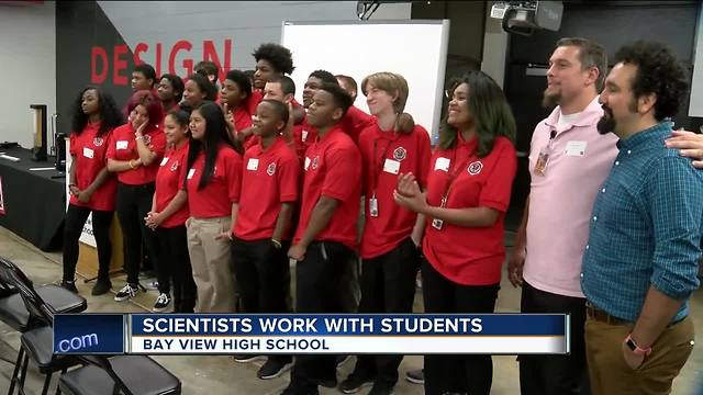 Scientists work side-by-side with students at Bay View High School