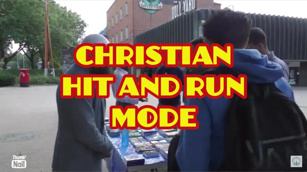 Visitors from the USA come to the Dawah Stall.