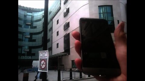 In front of BBC Broadcasting House, shouting for the TI community, with a huge placard and leaflets