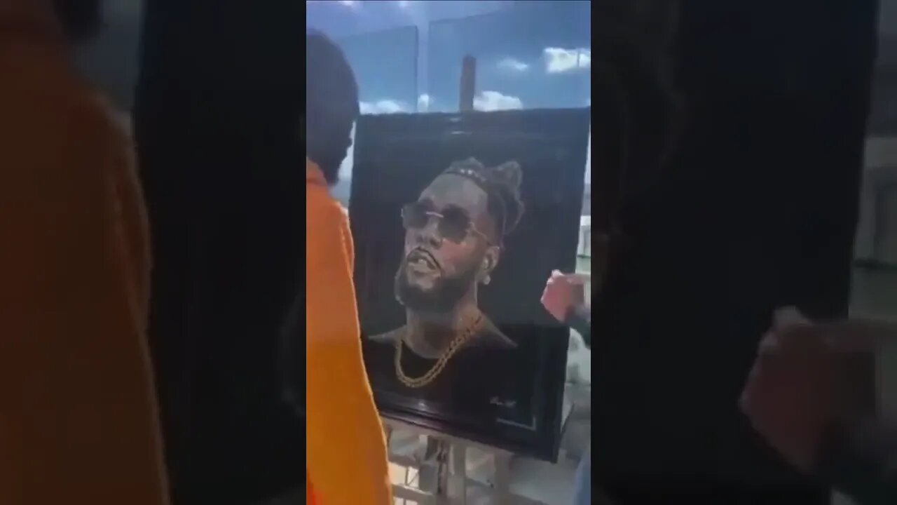 A fan made Burna Boy a portrait with Diamonds and Crystals, his reaction was priceless