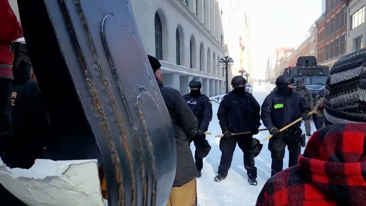 Singing to the armed Police. Ottawa Truckers freedom Protest Feb 19 2022