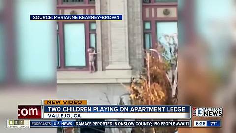 Video of children on apartment ledge