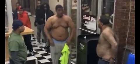 Black men fighting in L George’s Coney Island Restaurant in Michigan