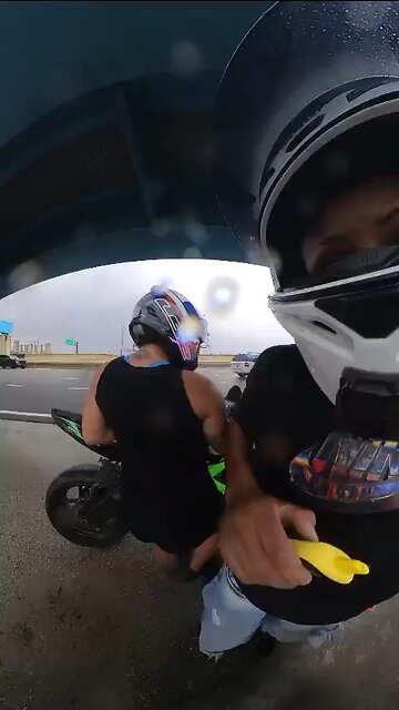 Biker's girlfriend gets hit by runaway tire!