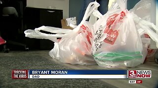 Father & Son give out free boxed lunches