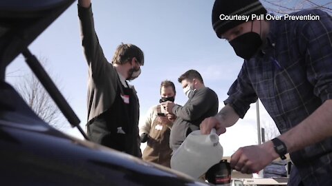 Michigan community members perform minor car repairs, help minorities avoid police interactions