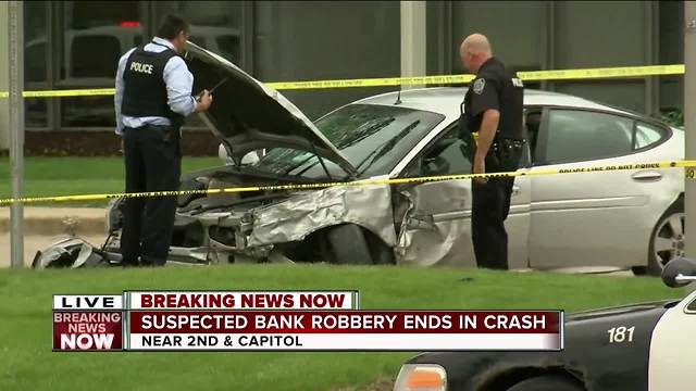 Suspected bank robbery ends in crash