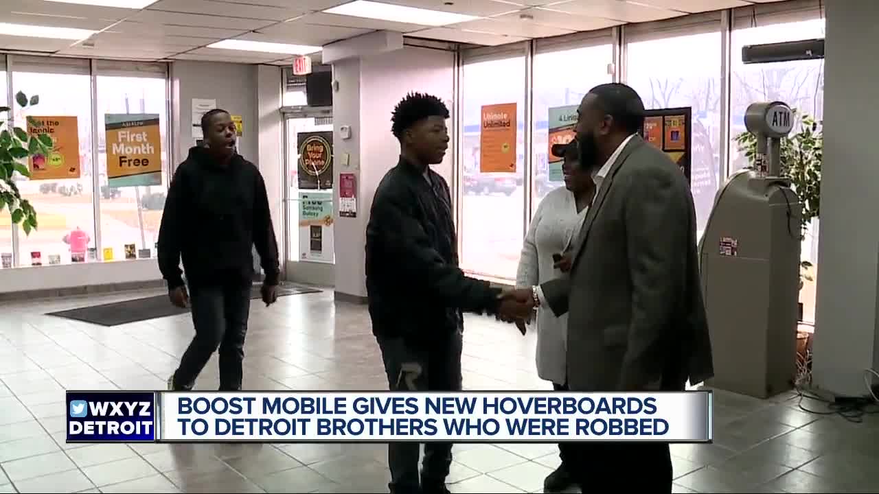 Boost mobile gives new hoverboards to Detroit brothers who were robbed