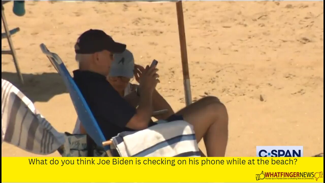 What do you think Joe Biden is checking on his phone while at the beach?