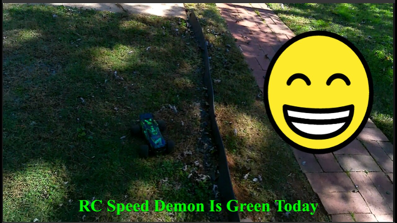 RC Speed Demon Is Green In Back Yard Today