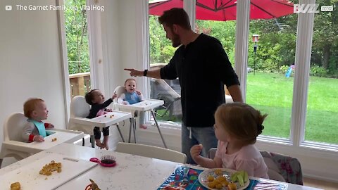 Dad makes kids burst out laughing during mealtime