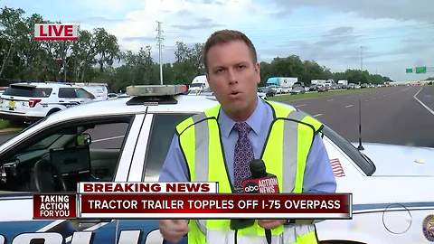 1 dead in fiery crash on I-75 and Fowler involving semi truck that fell on vehicle