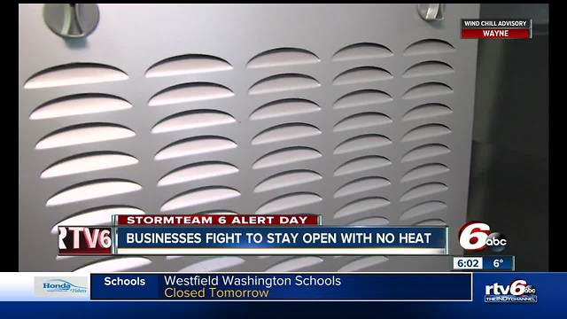 Businesses fight to stay open with no heat