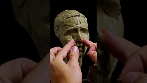 Sculpting The Face In Clay.