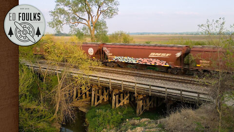 Flying up a creek to get an evening snag of a grainer on the BNSF Marceline Sub outside of Henrietta