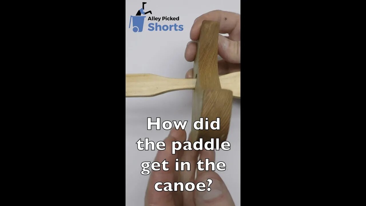 Paddle through the canoe trick