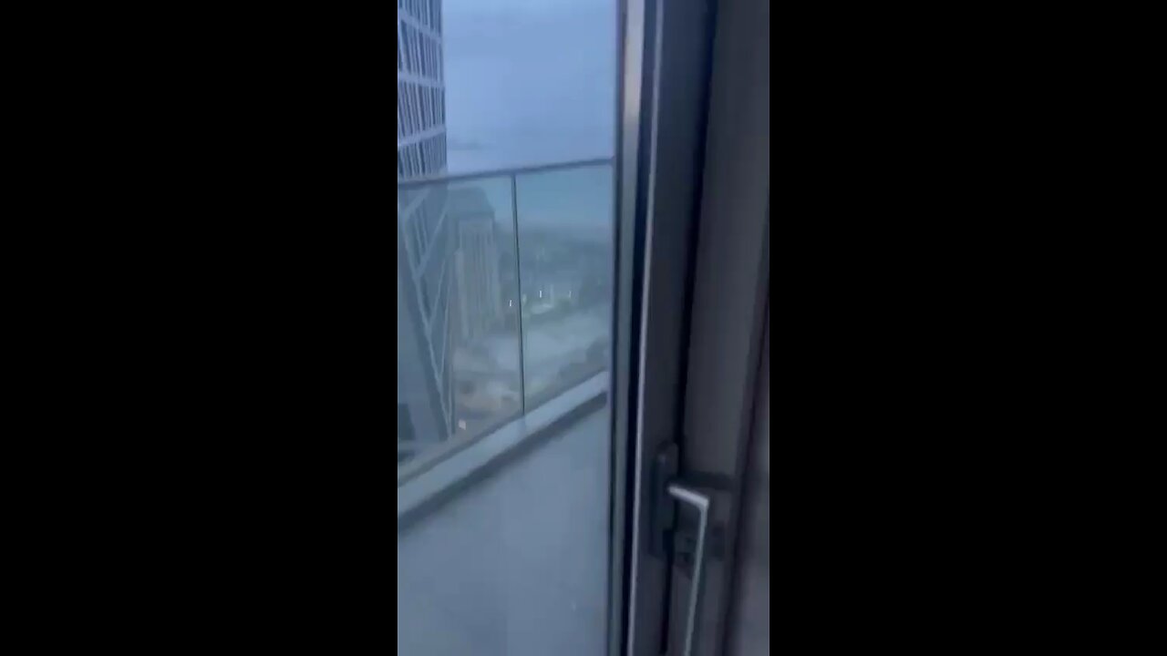 Heavy winds in Dubai slams window cleaner into building