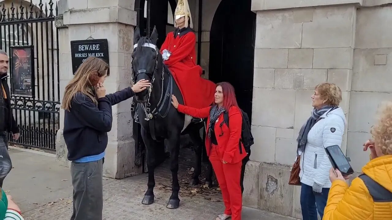 The kings guard shouts at young girl get off the Reins #horseguardsparade