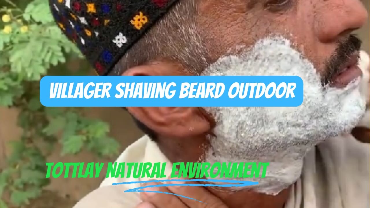 Traditional villager shaving beard outdoor from baber