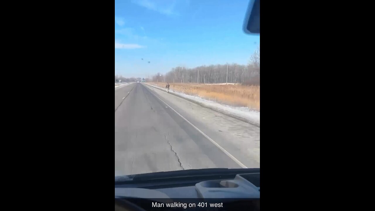 Pedestrian Walking On Highway 401