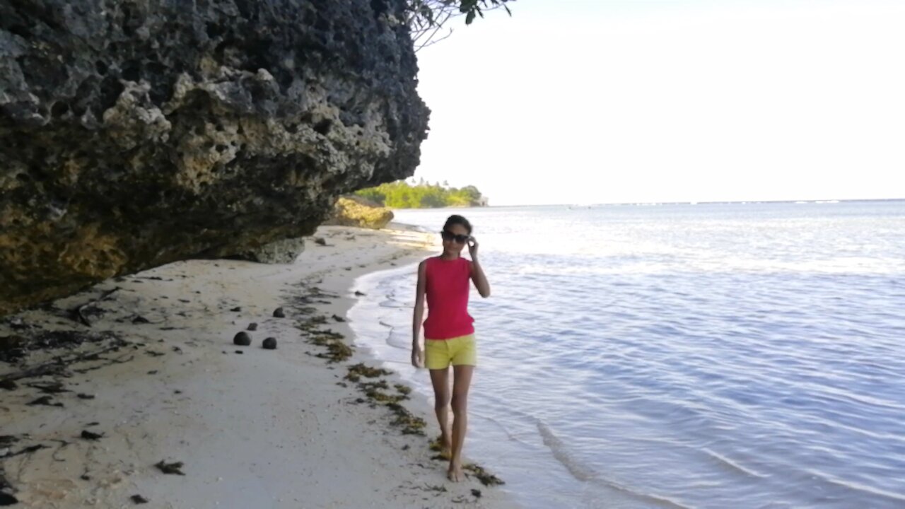 Filipina Graceful walk in a Beach