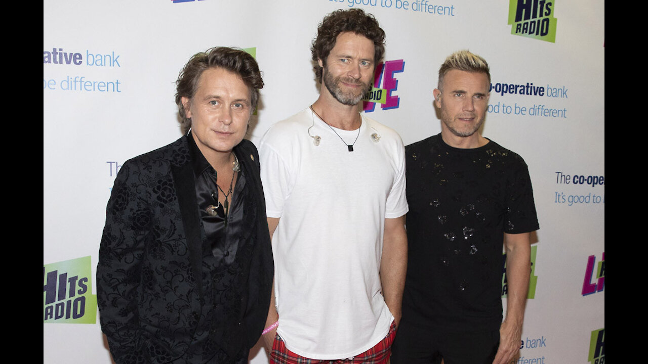 Take That are 'desperate' to get back on the road again as soon as it's safe for fans