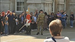 Kings guard and a soldier telling tourist's to get behind the white line #horseguardsparade