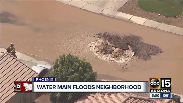 Road caves in after Phoenix water main break