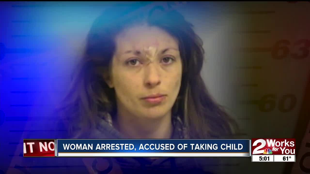 Woman arrested, accused of taking child