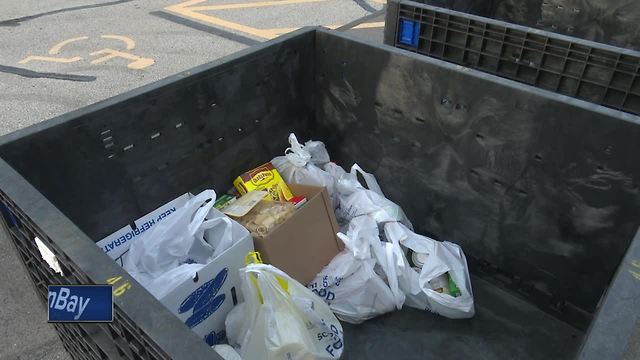 Boy Scouts help collect food for local charities