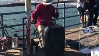 The Street Artist Plays "Đàn Nhị" (Vietnamese Two-Chord Fiddle)