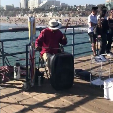 The Street Artist Plays "Đàn Nhị" (Vietnamese Two-Chord Fiddle)