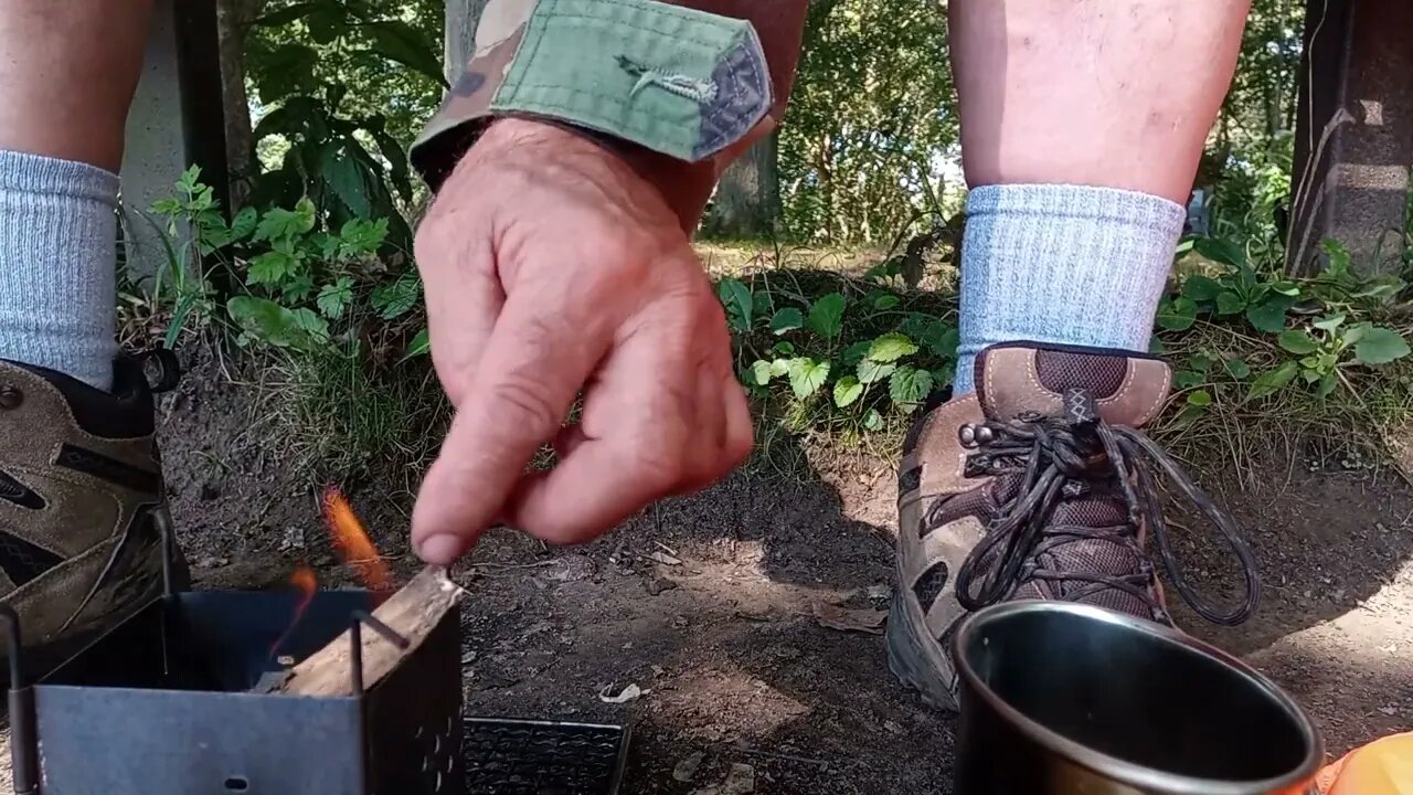 tryed out my new opinel saw making coffee along the river useong my firebox stove