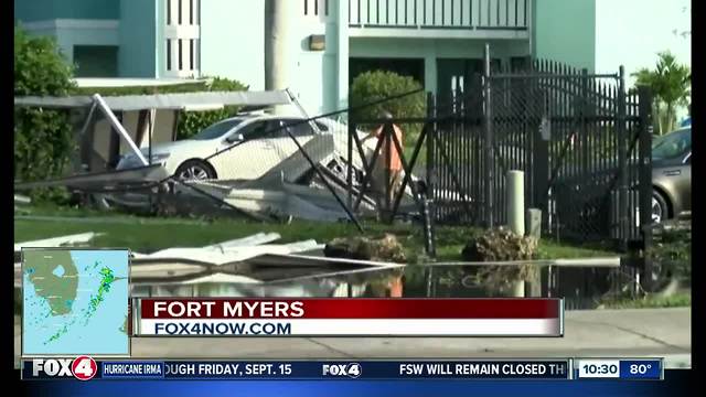 Carports destroyed and street flooding in downtown Fort Myers after Hurricane Irma