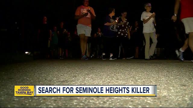 Law enforcement officers search for Seminole Heights killer