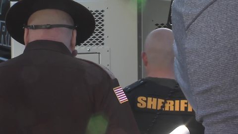 Man charged with fatal shooting of sheriff's deputy leaves court