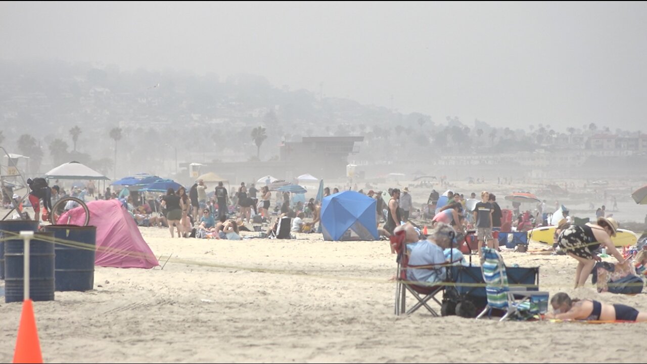 Visitors fill San Diego beaches as heat wave hits the Pacific Southwest