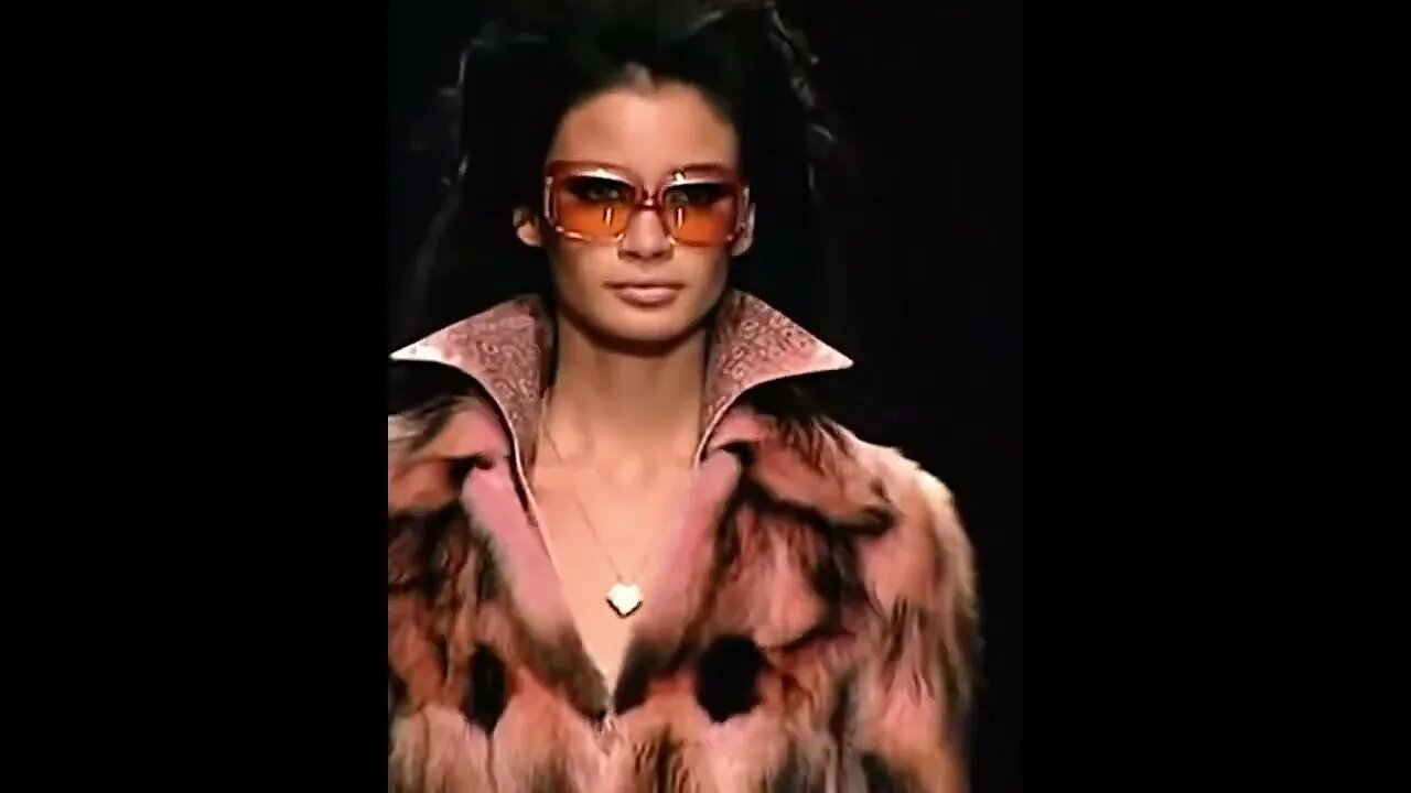 Caroline Ribeiro walks the Versace fall winter 2000 runway