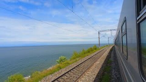A train ride along Lake Baikal to Ulan-Ude. Railway in Siberia