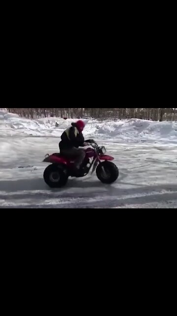Guy performs amazing side spin trick on 3-wheeler