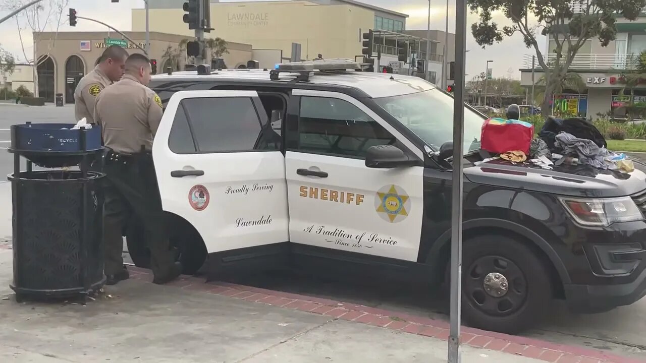 Sheriff’s Detain Man On Bicycle And Search His Belongings