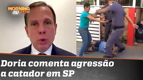 Policiais são afastados por agressão a catador; Doria comenta