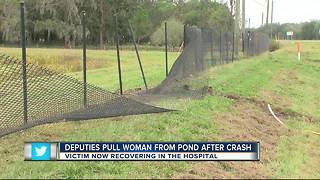 Deputies pull woman from pond